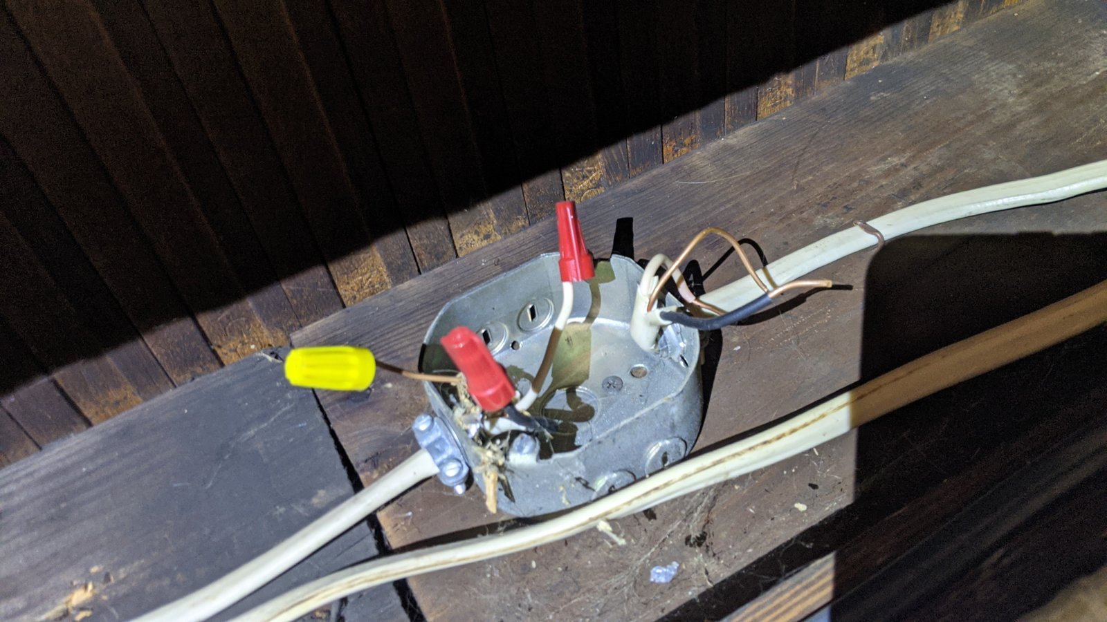 Open junction box: no cover, splices exposed