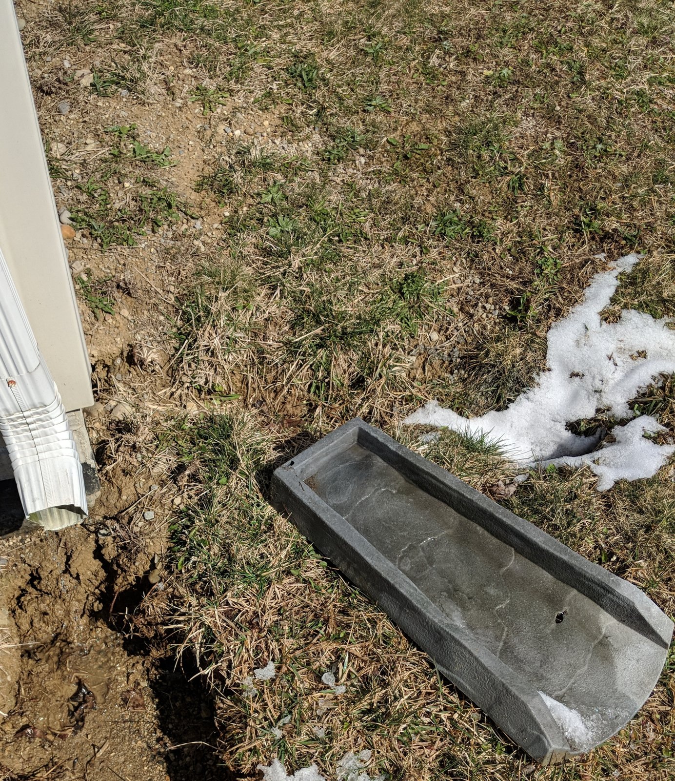 Splash block: pulled away from the downspout
