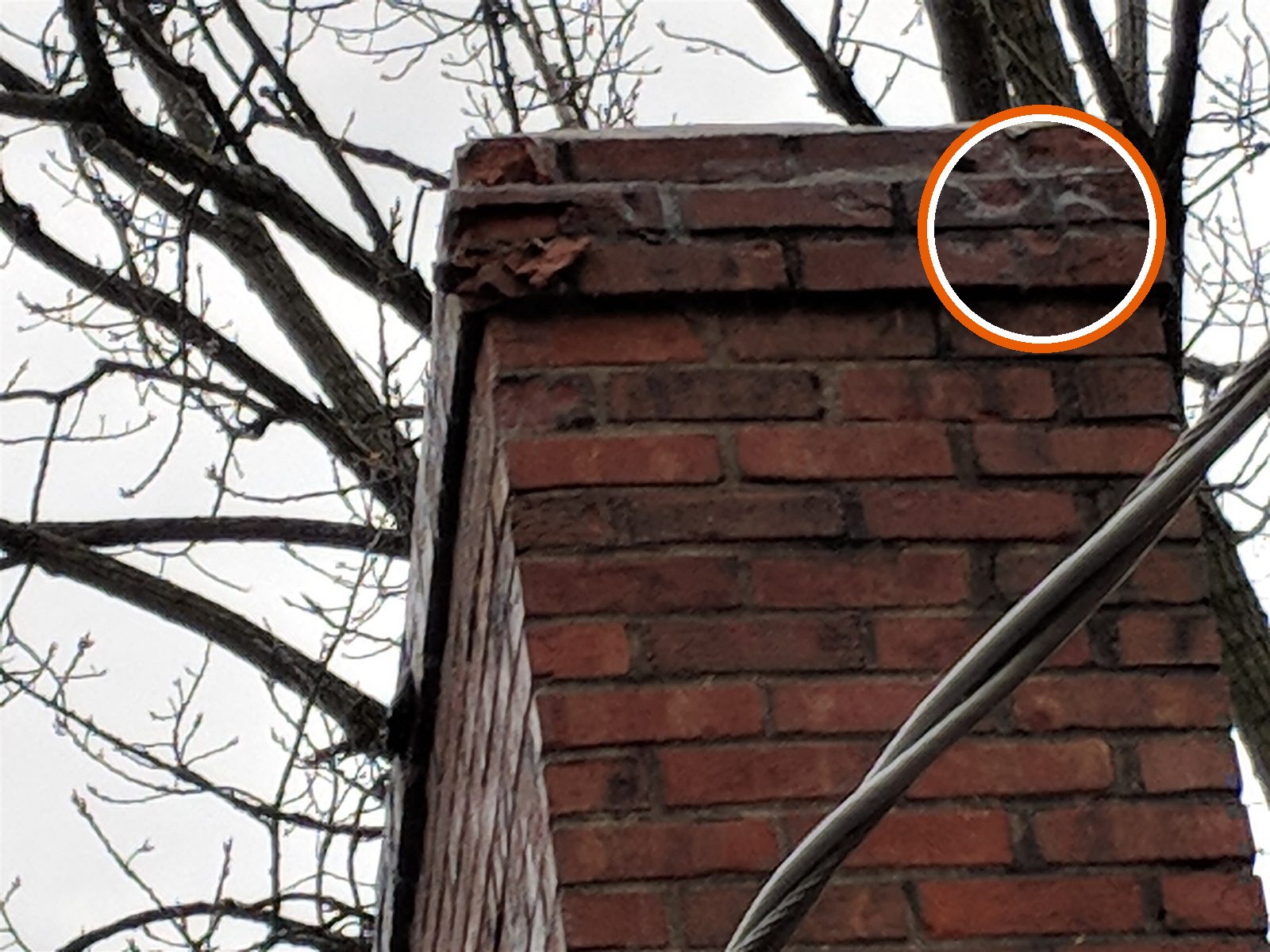 Chimney top: cracked brick and broken mortar